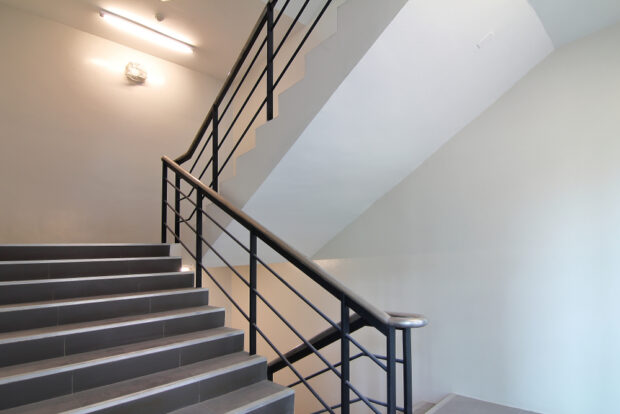 Custom Metal Design Elements: Stair Railings, Canopy Structures & Planter Surrounds for Commercial Spaces